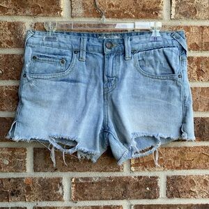 Free people distressed light wash denim shorts